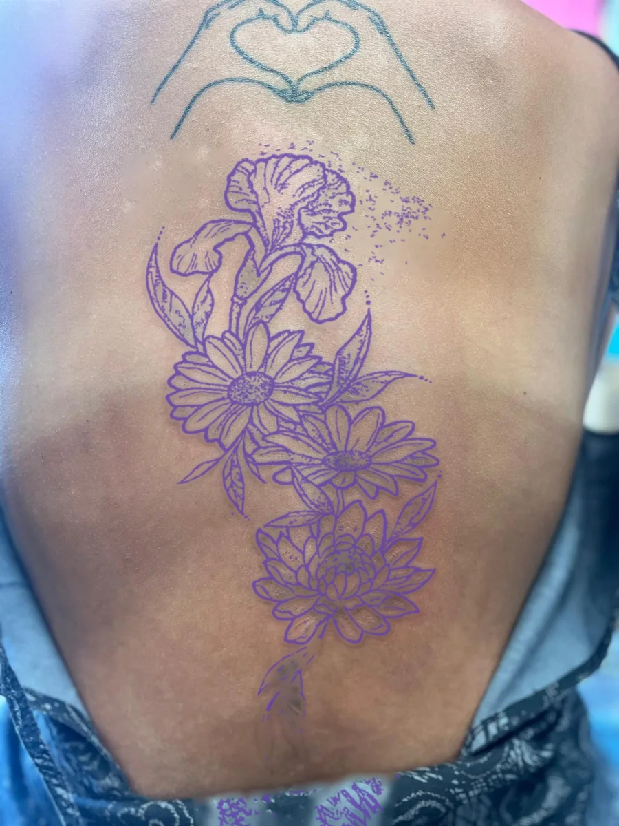 Spine piece shown as a purple stencil